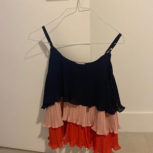Unique color block top worn once size small but runs large